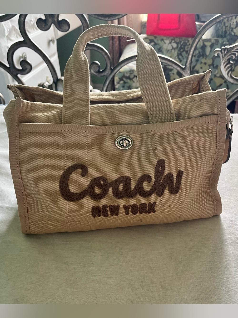 Coach Canvas small Tote
- Beige/Tan (Includes Strap)